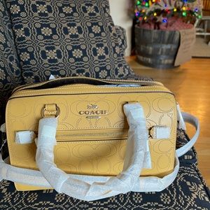 Brand new Rowan coach, with tags! Color Honey!